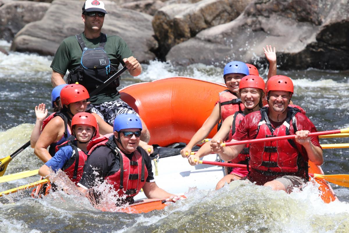 Big family of rafters paddling Hudson River whitewater