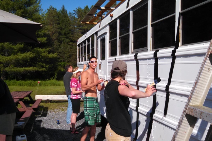 Guides painting the bus